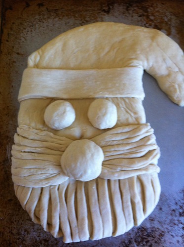 dough shaped as santa bread