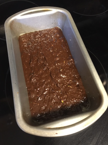 chocolate chip zucchini bread in loaf pan ready to be cooked