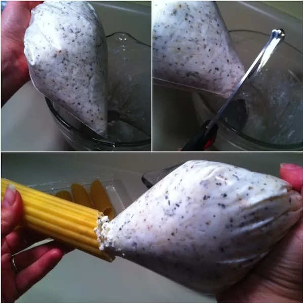 piping cheese mixture into manicotti shells