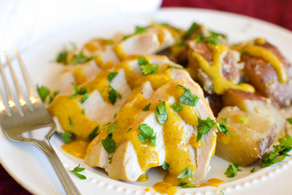 plate of chicken with maple mustard sauce