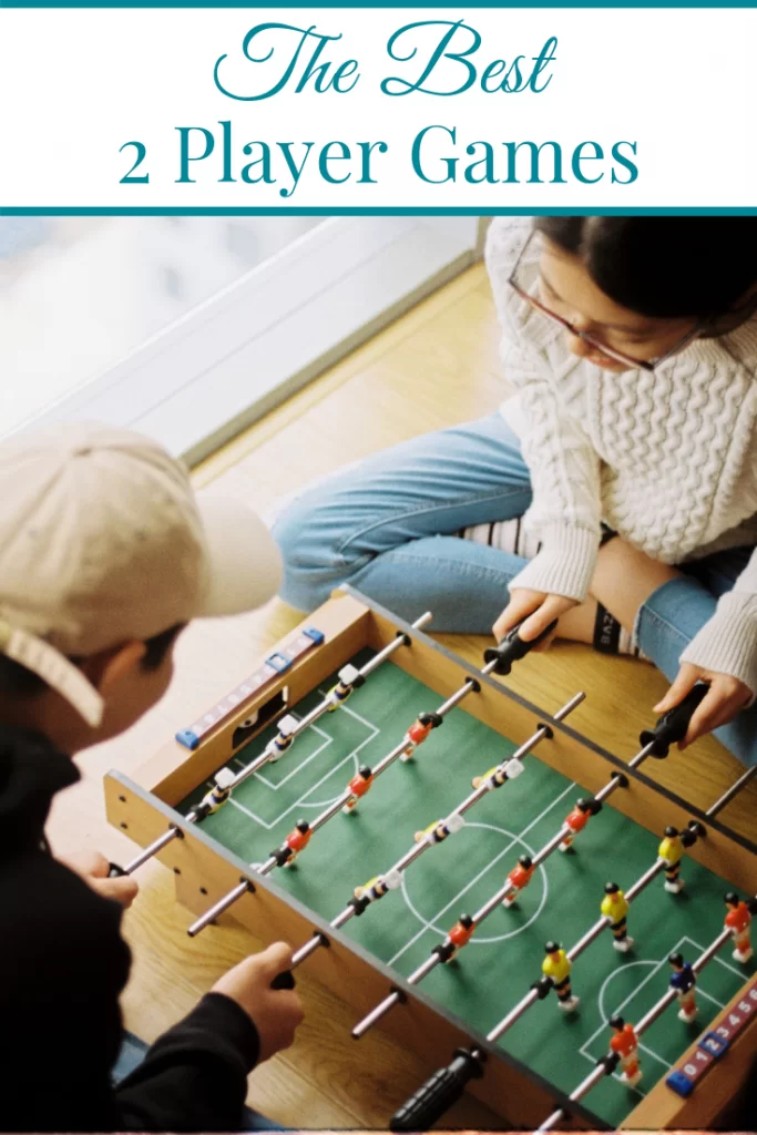 couple playing mini foosball