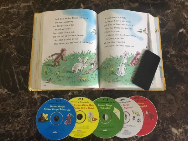 Keeping a child entertained in the car for a few hours can be a daunting task, especially when you don't want them to watch movies the entire time. And that, my friend, is why I put together this list of screen free road trip activities for preschoolers. The items on this list saved my sanity on our recent 9 hour road trip! curious George read along book with cds and iPod