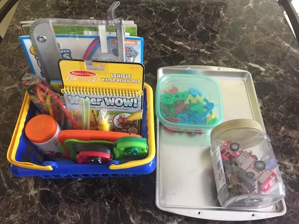 Keeping a child entertained in the car for a few hours can be a daunting task, especially when you don't want them to watch movies the entire time. And that, my friend, is why I put together this list of screen free road trip activities for preschoolers. The items on this list saved my sanity on our recent 9 hour road trip! screen free road trip activities organized in a basket