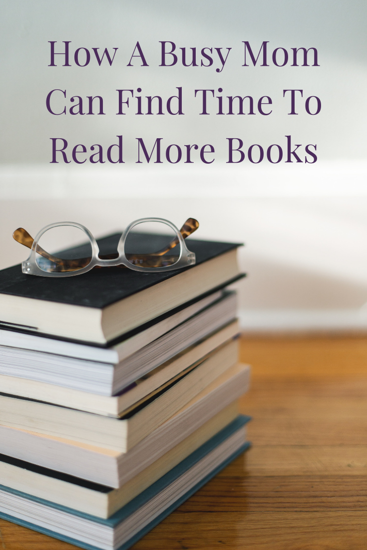 stack of books with glasses on top