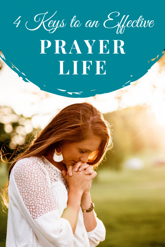 woman in grassy area praying