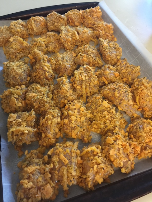 pan of chicken nuggets ready to be baked