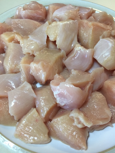 cubes of raw chicken