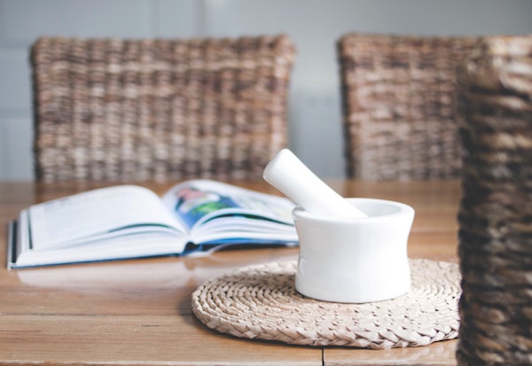 mortar and pestle on top of a table