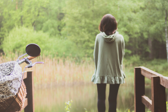 woman standing on dock