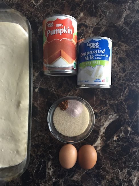 pumpkin mixture beside cream cheese mixture in pan