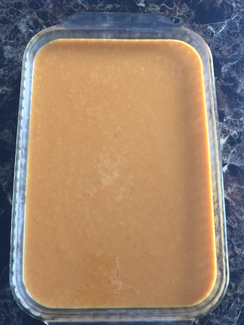 pan of cooked pumpkin cheesecake bars