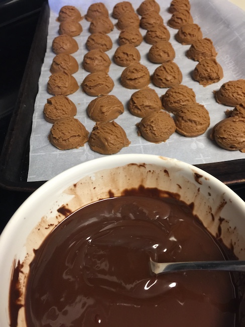 peanut butter balls and melted chocolate