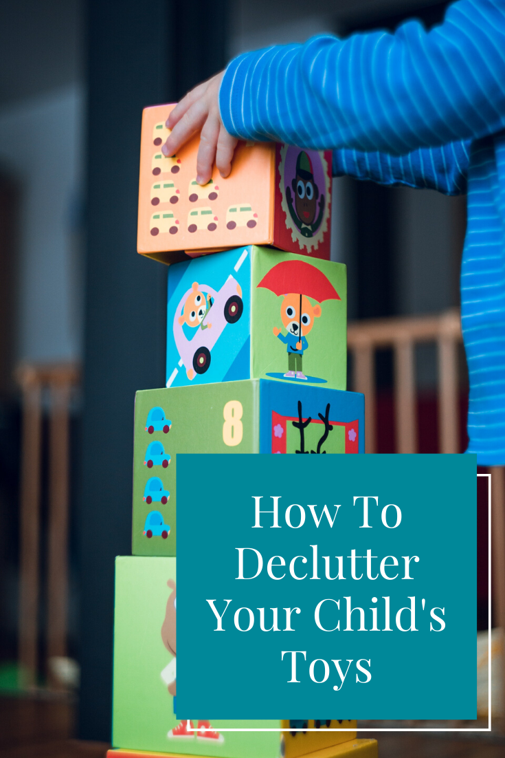 child stacking blocks