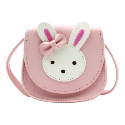 pink crossbody purse with a white rabbit face on the flap