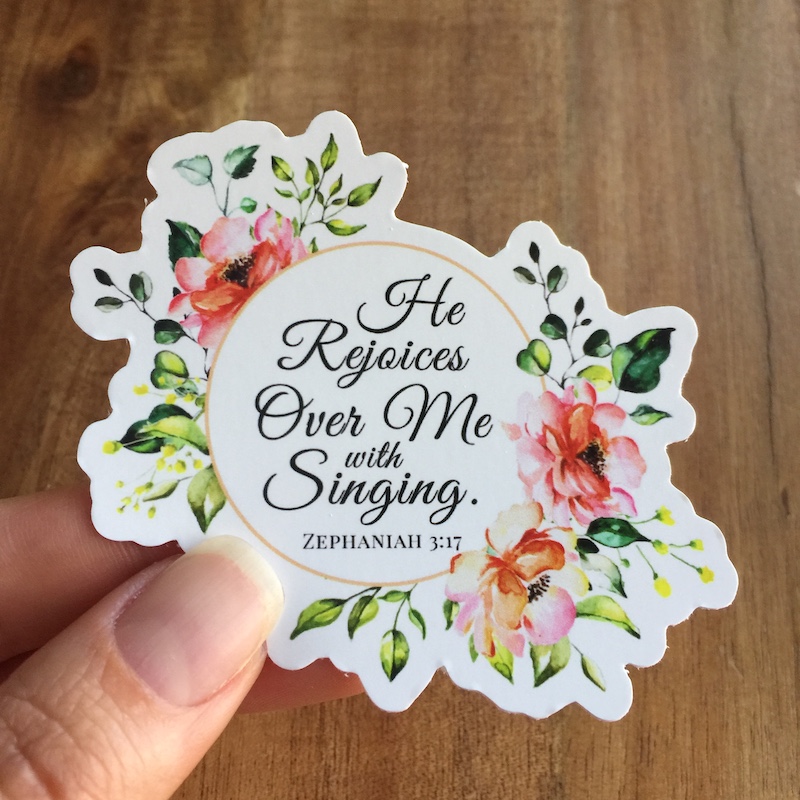 he rejoices over me with singing floral mirror cling