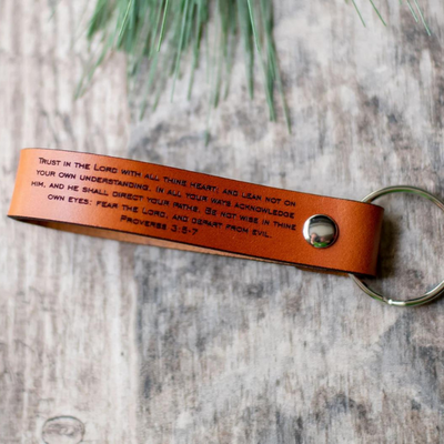 leather keychain with bible verse on it