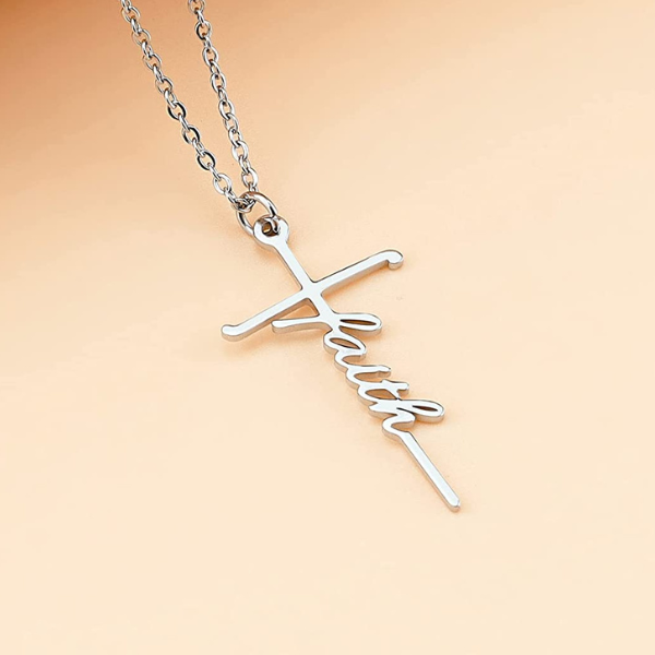 necklace with pendant of cross with faith in cursive letters