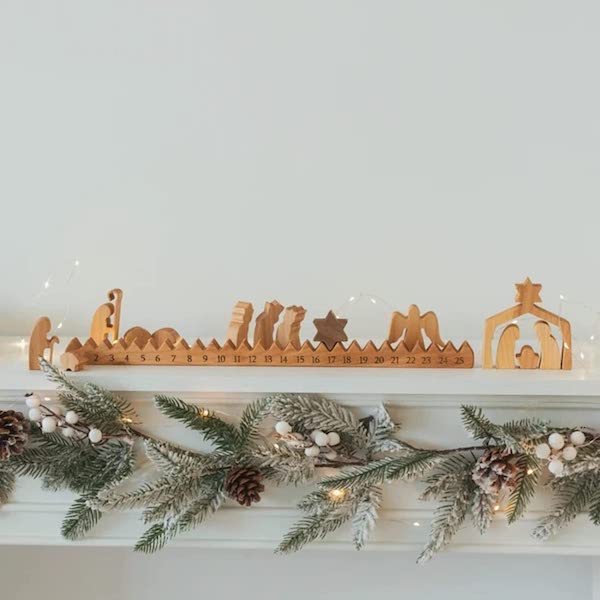 wooden nativity countdown with a star that moves from number to number