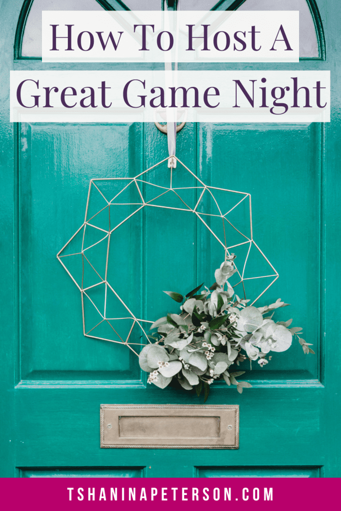 teal door with silver wire wreath - how to host a great game night