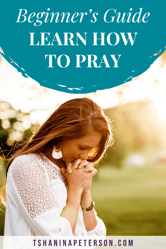 beginner's guide to learn how to pray - woman praying outside in a grassy area