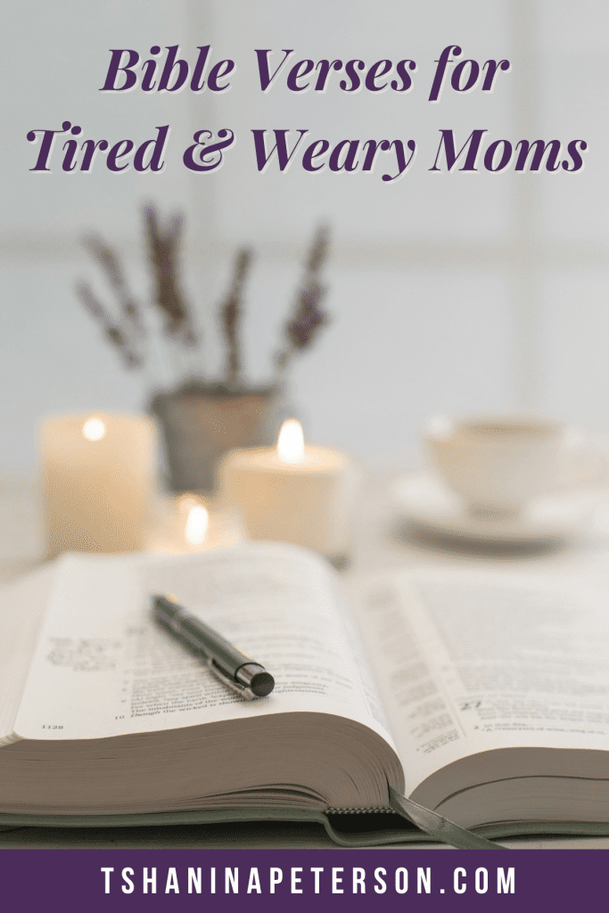 open bible sitting beside candles and cup of tea - bible verses to encourage tired and weary moms