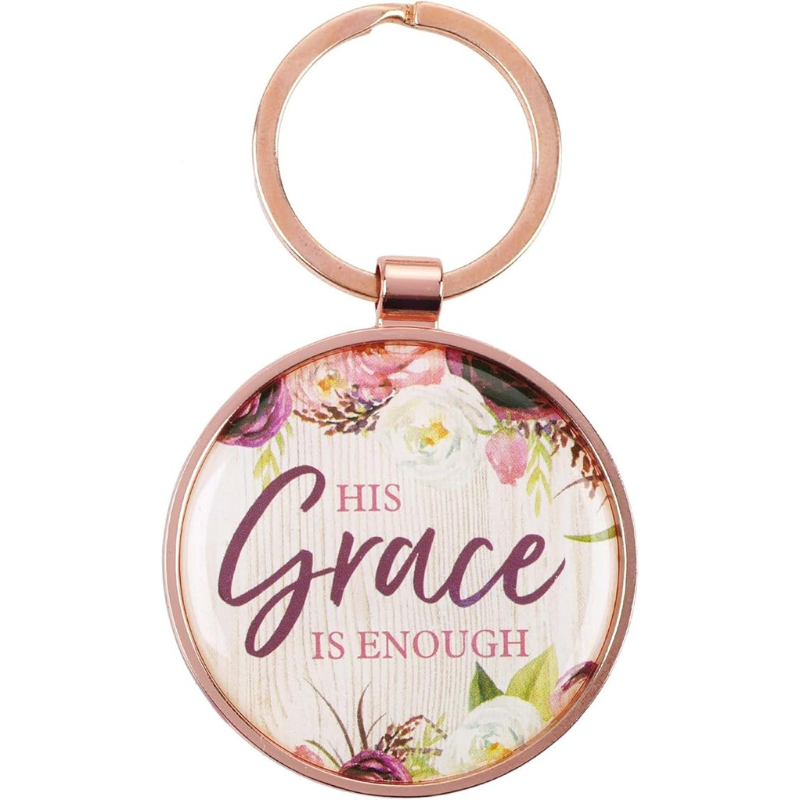 rose gold key ring with floral center and the words his grace is enough